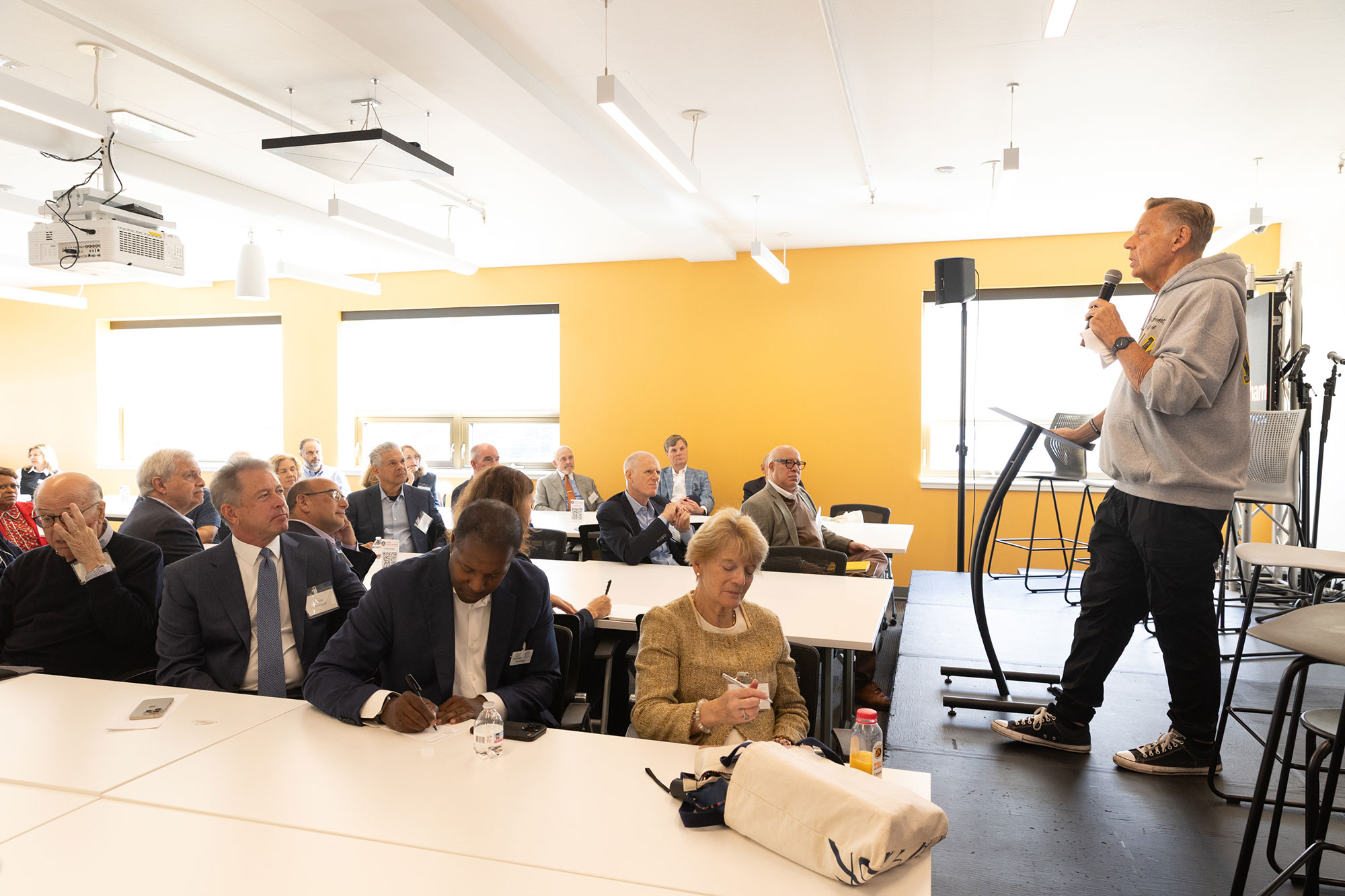 A person speaks to an audience