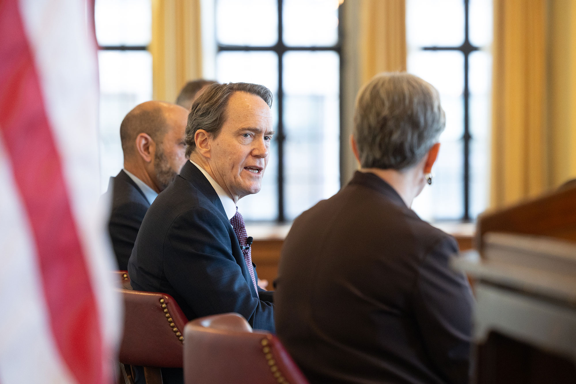 A person talks while facing another person