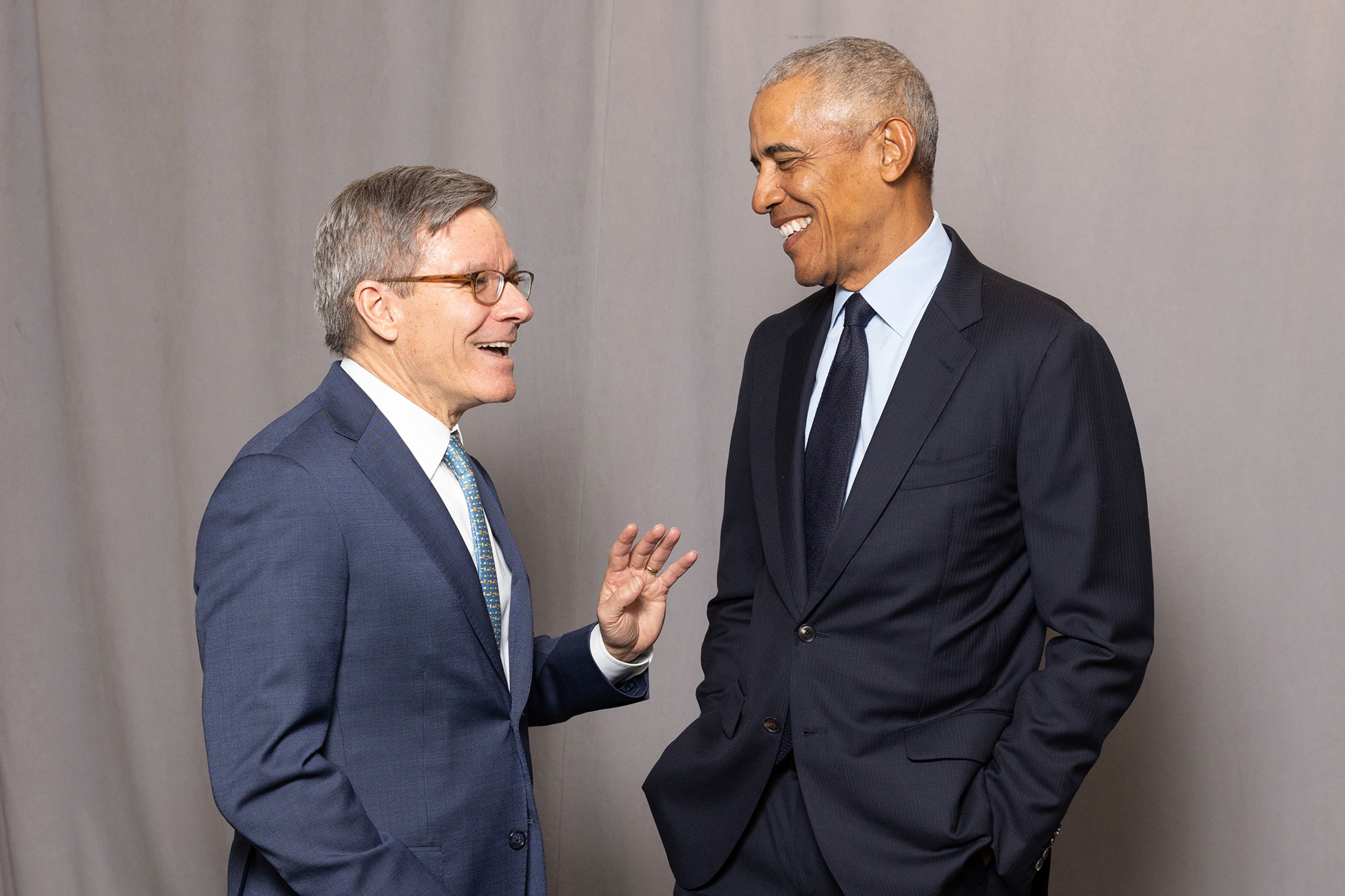 Two people talk together