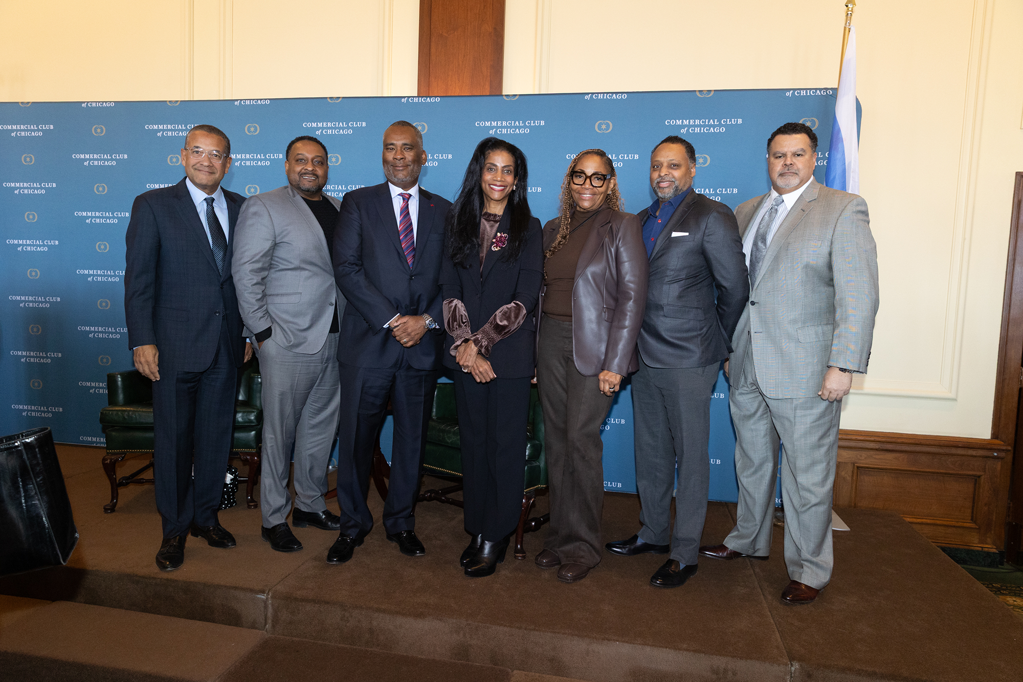 A group of people stand together