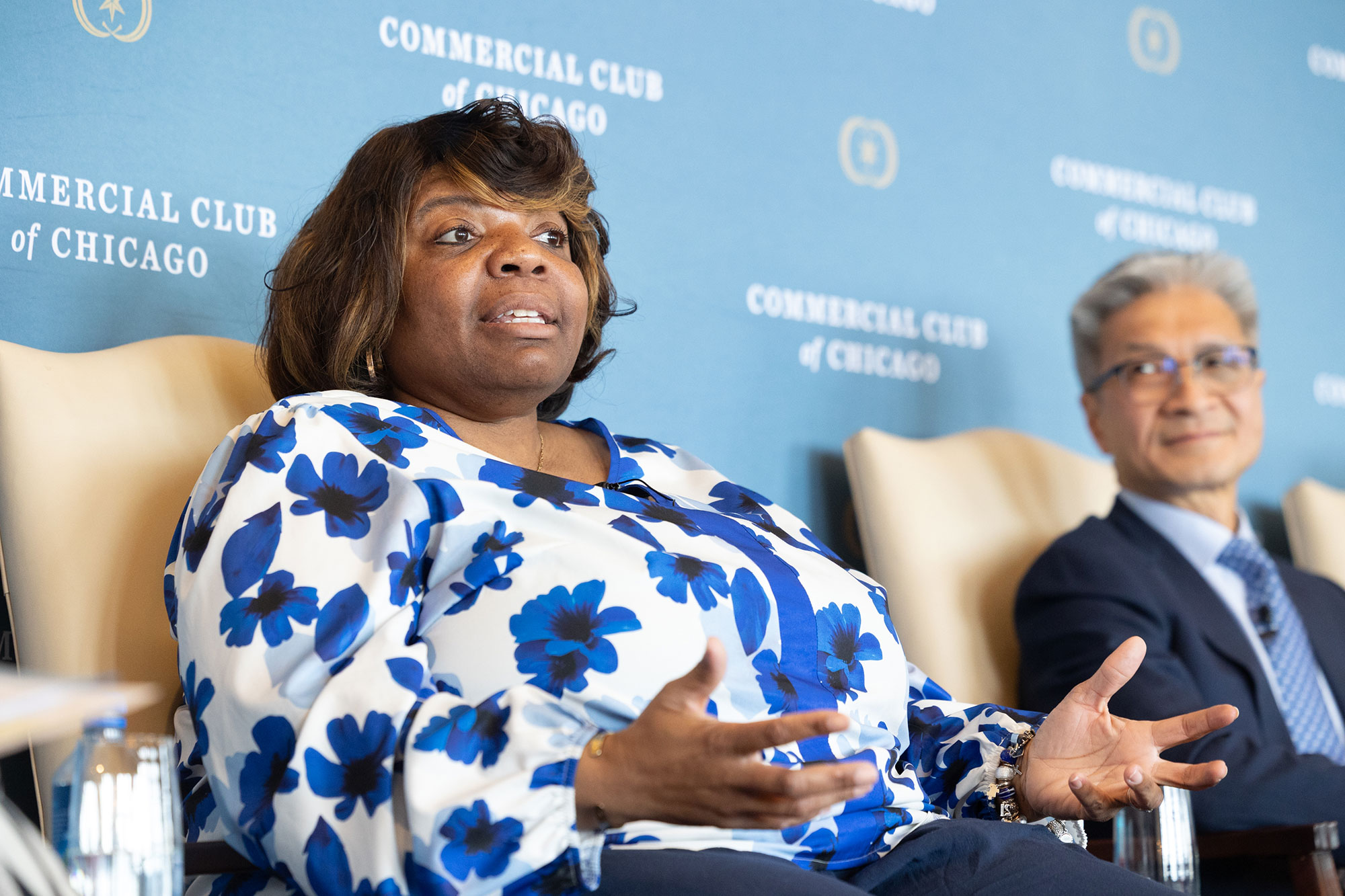 A person on stage speaks