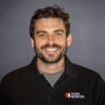 A professional headshot of a man.