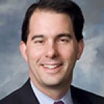 A professional headshot of a man.