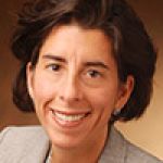 A professional headshot of a woman.