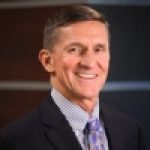 A professional headshot of a man.